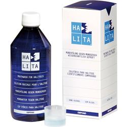 Eine blaue Mundwasserflasche neben einer weißen Verpackung.